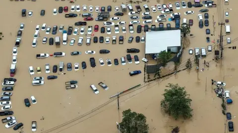 'Once in 300 years' rain hits Thai city as floods ravage South East Asia