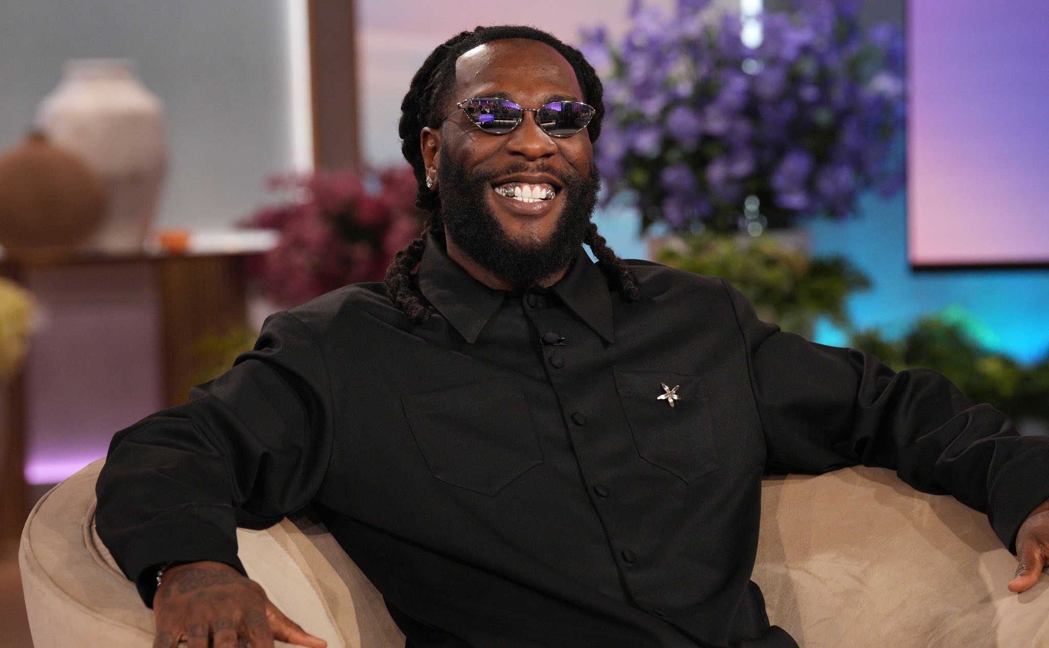 Burna Boy Defends Ejecting Sleeping Fan, Demands 'Fans with Money'