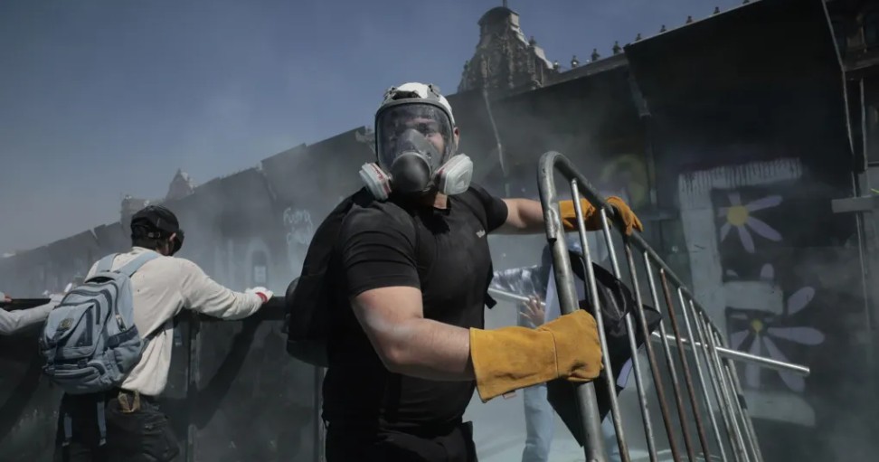 Clashes erupt in Mexico as thousands protest against State
