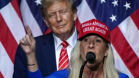 Trump ally Marjorie Taylor Greene to quit Congress after Epstein files feud