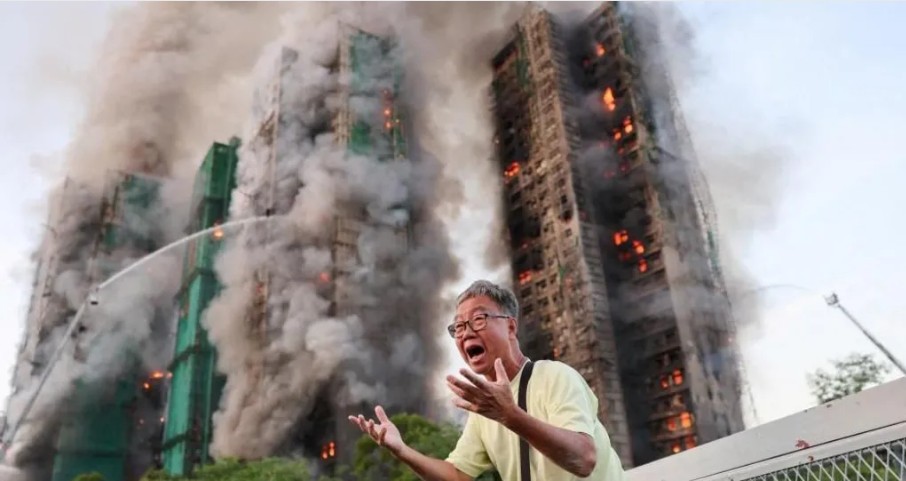 Over 65 dead, hundreds missing in Hong Kong tower blocks fire