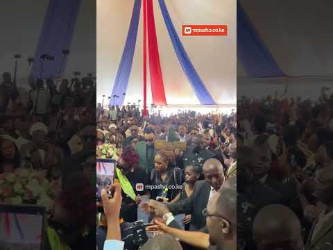 How Betty Bayo's Husband Received her Bidy at Ndumberi Stadium during the funeral service