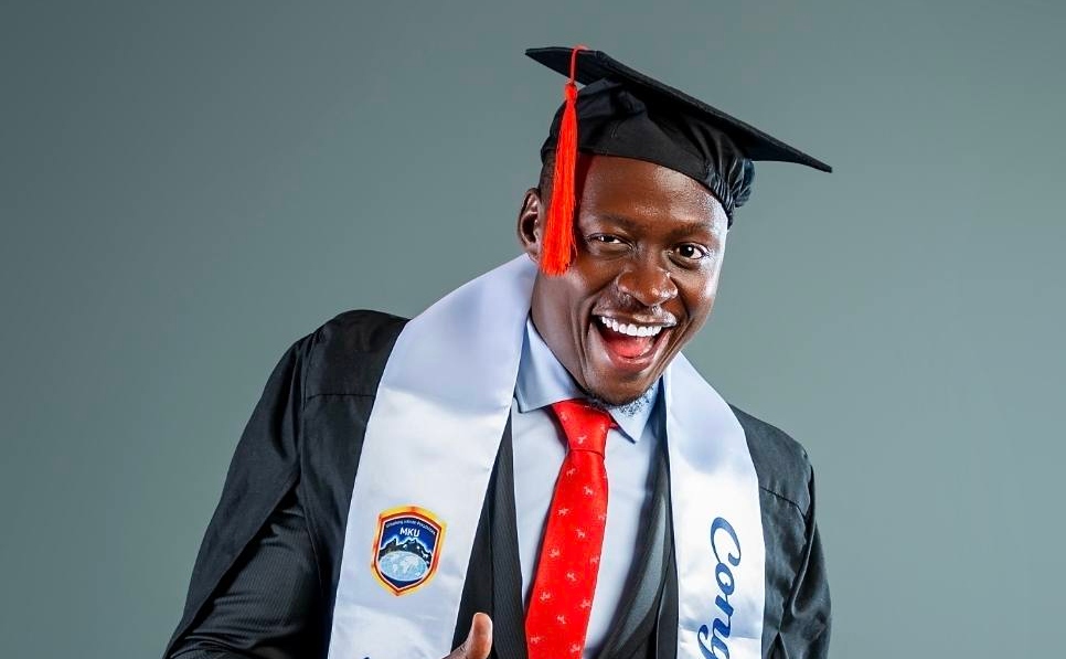 Obinna Celebrates First-Class Degree from MKU