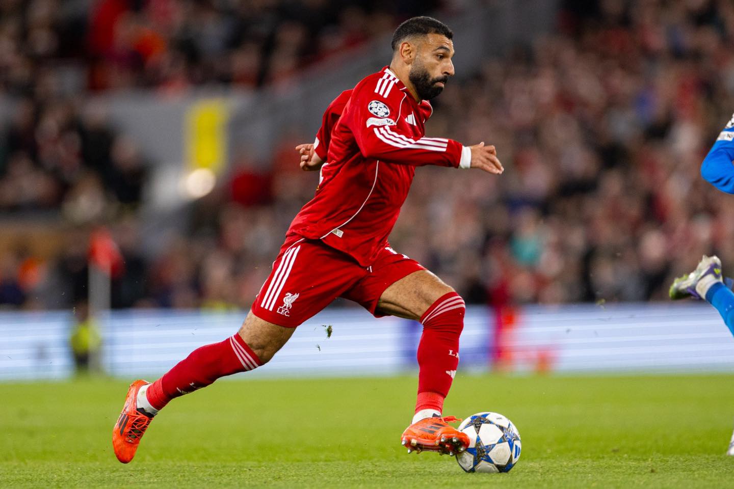 Liverpool foward Mo Salah in action