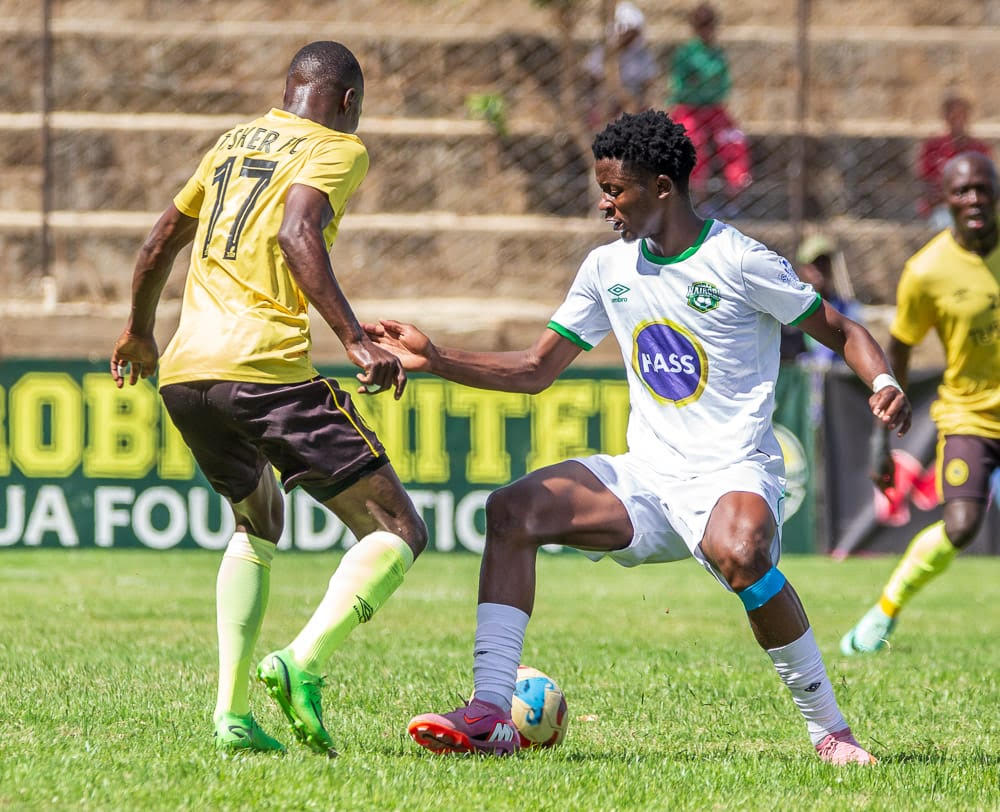 Nairobi United's Manzur Okwaro tussles for the ball with Tusker's Dennis Wanjala/HANDOUT