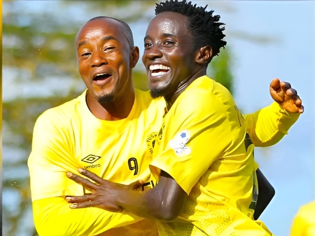 Tusker FC's Ian Simiyu (R) is congratulated by teammate Eric Kapaito after scoring against Sofapaka on Sunday