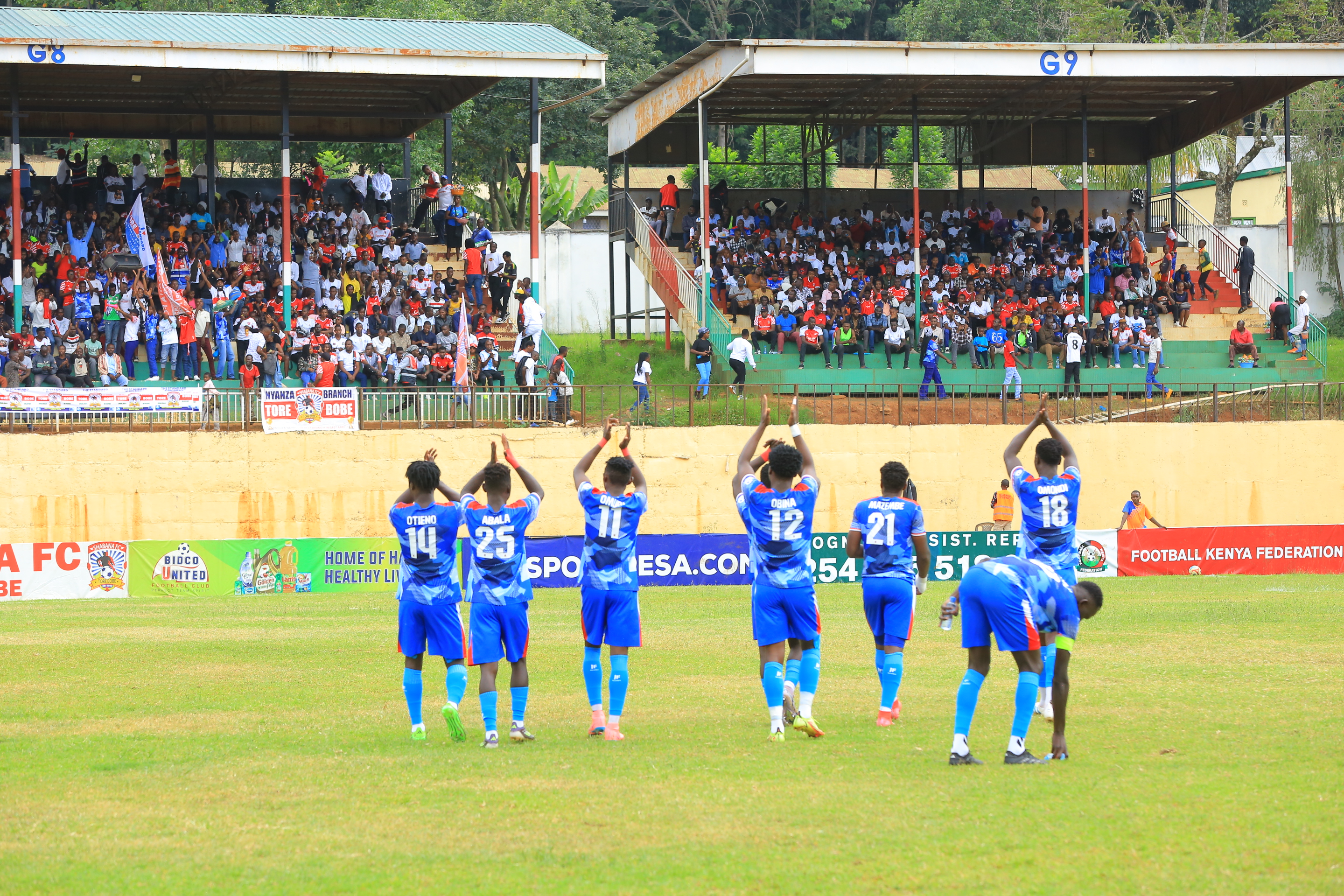 Shabana players acknowledge cheers from their fans at Gusii Stadium