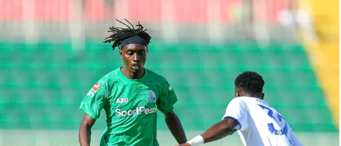 Gor Mahia's Paul Ochuoga takes on Jimmy Owili of Mara Sugar during their KPL encounter at Nyayo stadium/GOR