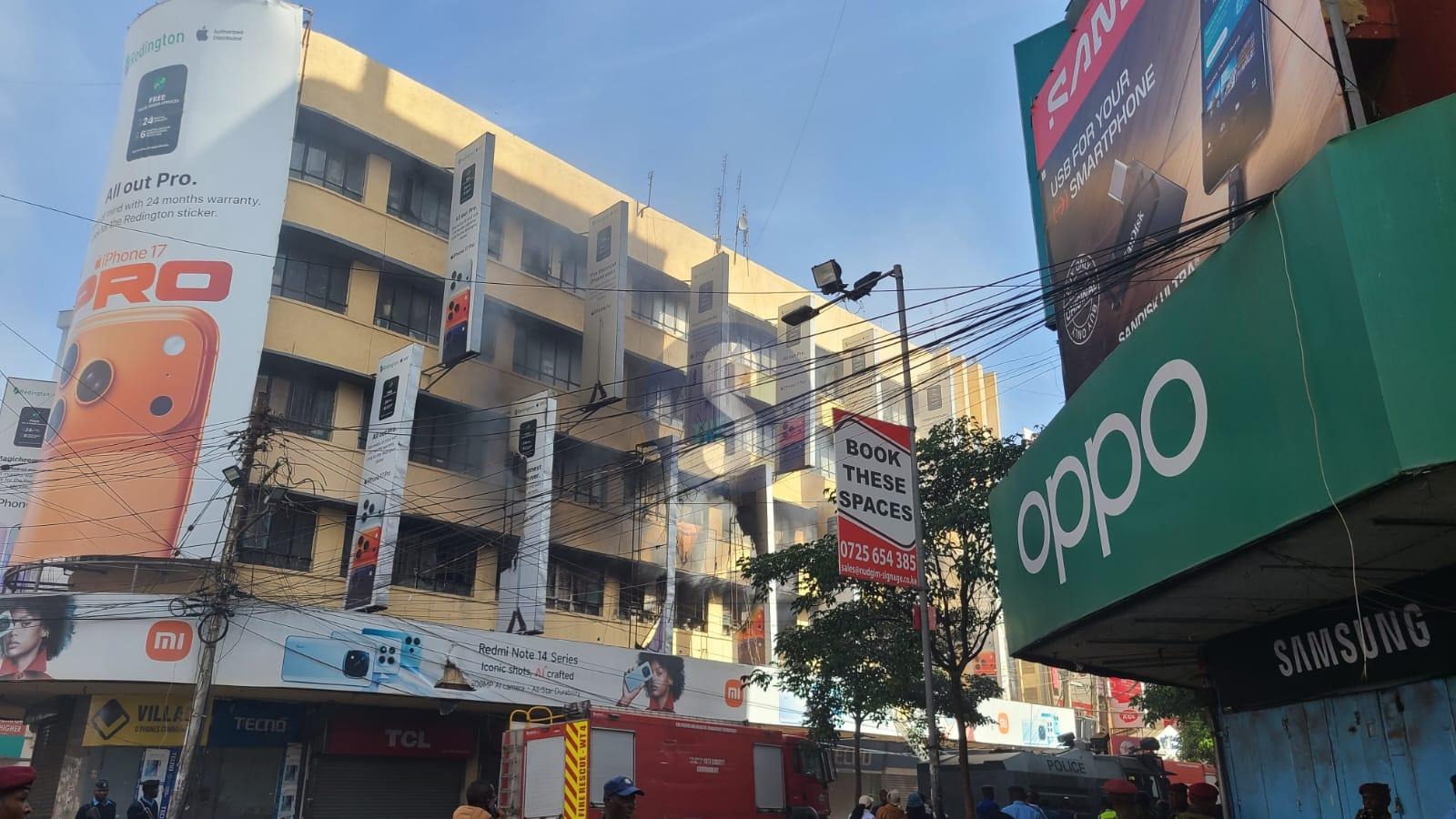 [PHOTOS] Shops closed after Nairobi building fire, police guard area