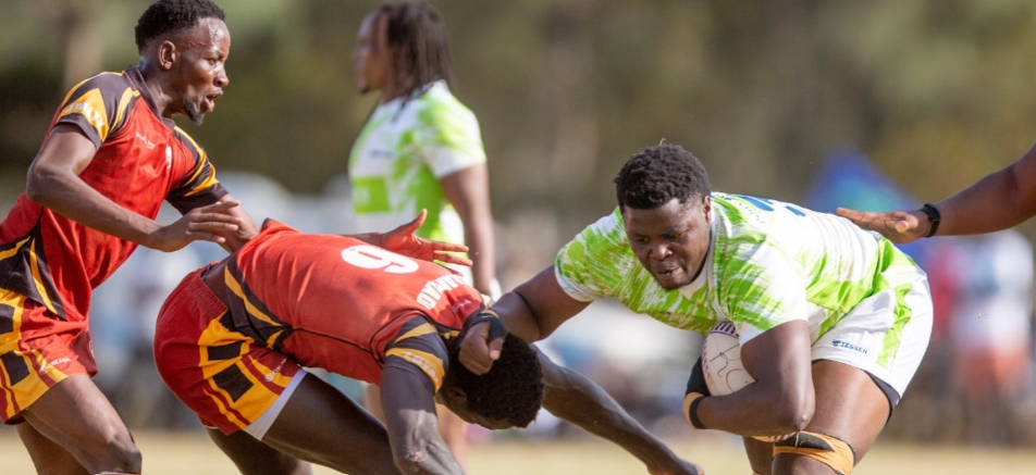 KCB lock Andy Cole Omollo fends off a Blak Blad player during their Kenya Cup match over the weekend/HANDOUT