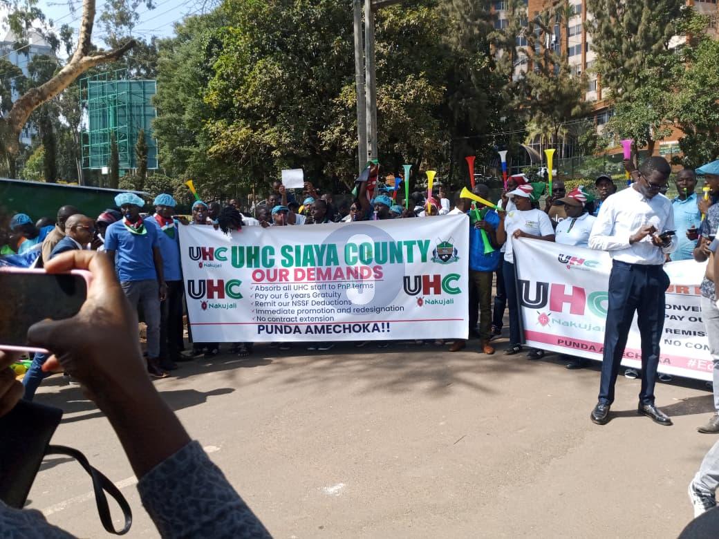 [PHOTOS] UHC workers take to the streets over pay delays