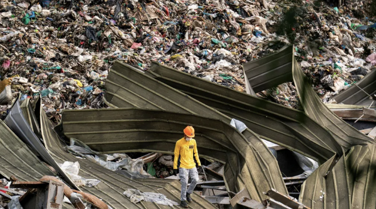 Death toll in Philippines landfill collapse rises to 11