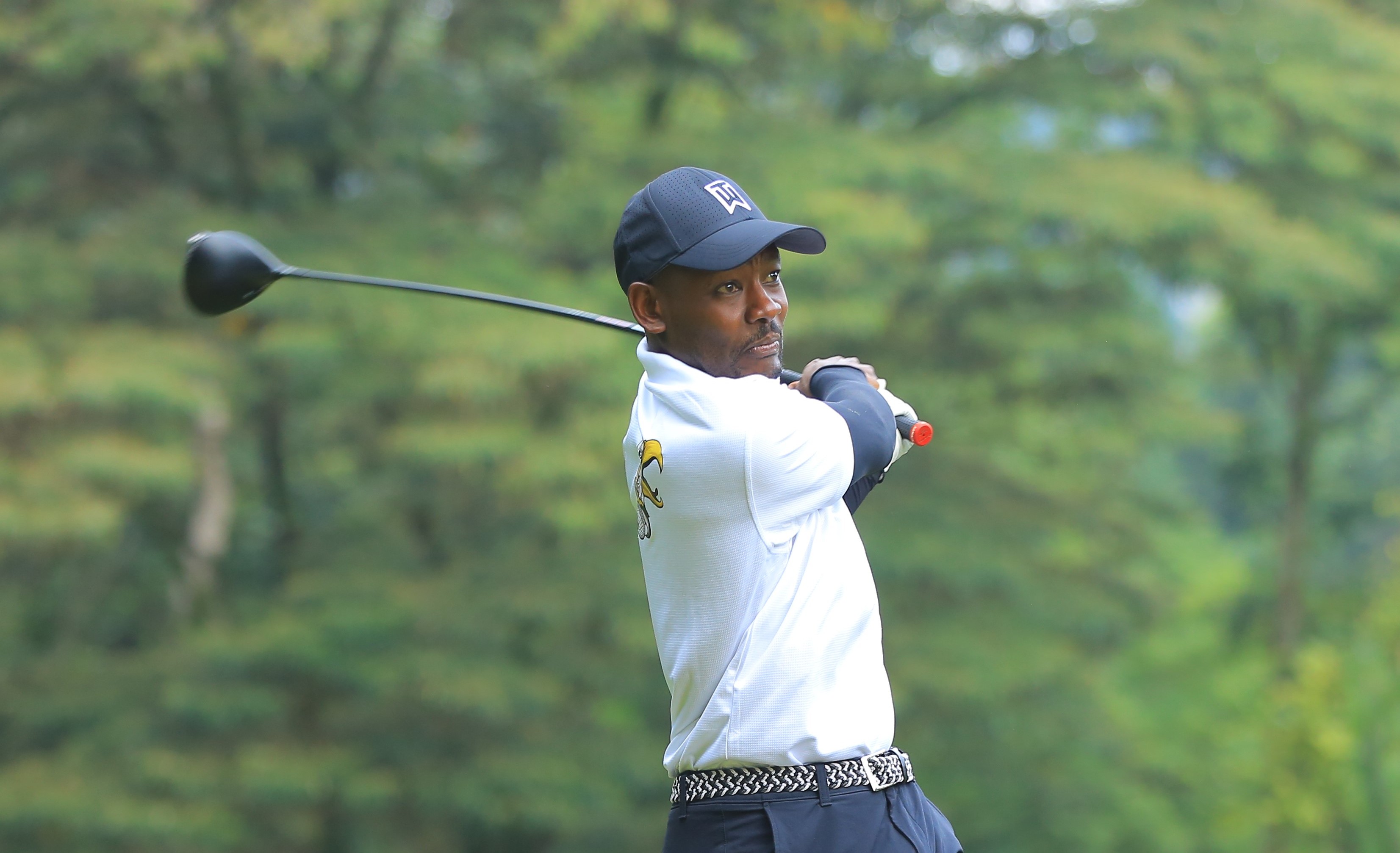 Kisii Sports Club golf captain Adrian Monari follows his shot. The club will host the Western Region Captain's Championship grand finale on Jan 10/ANGWENYI GICHANA