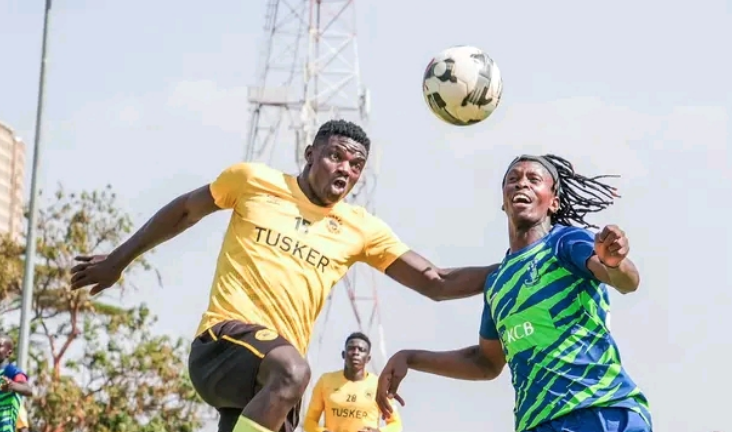 Tusker's Eugene Ikutwa (l) battles with Francis Kahiro of KCB during their Kenyan Premier League match at Kasarani Annexe on Sunday