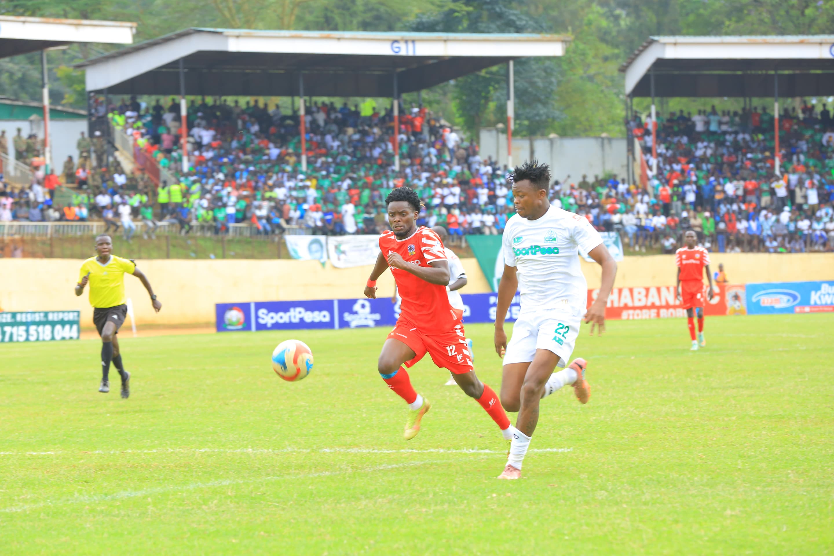Humphrey Obina of Shabana battles for the ball with Samuel Kapen of Gor during a league game at Gusii Stadium