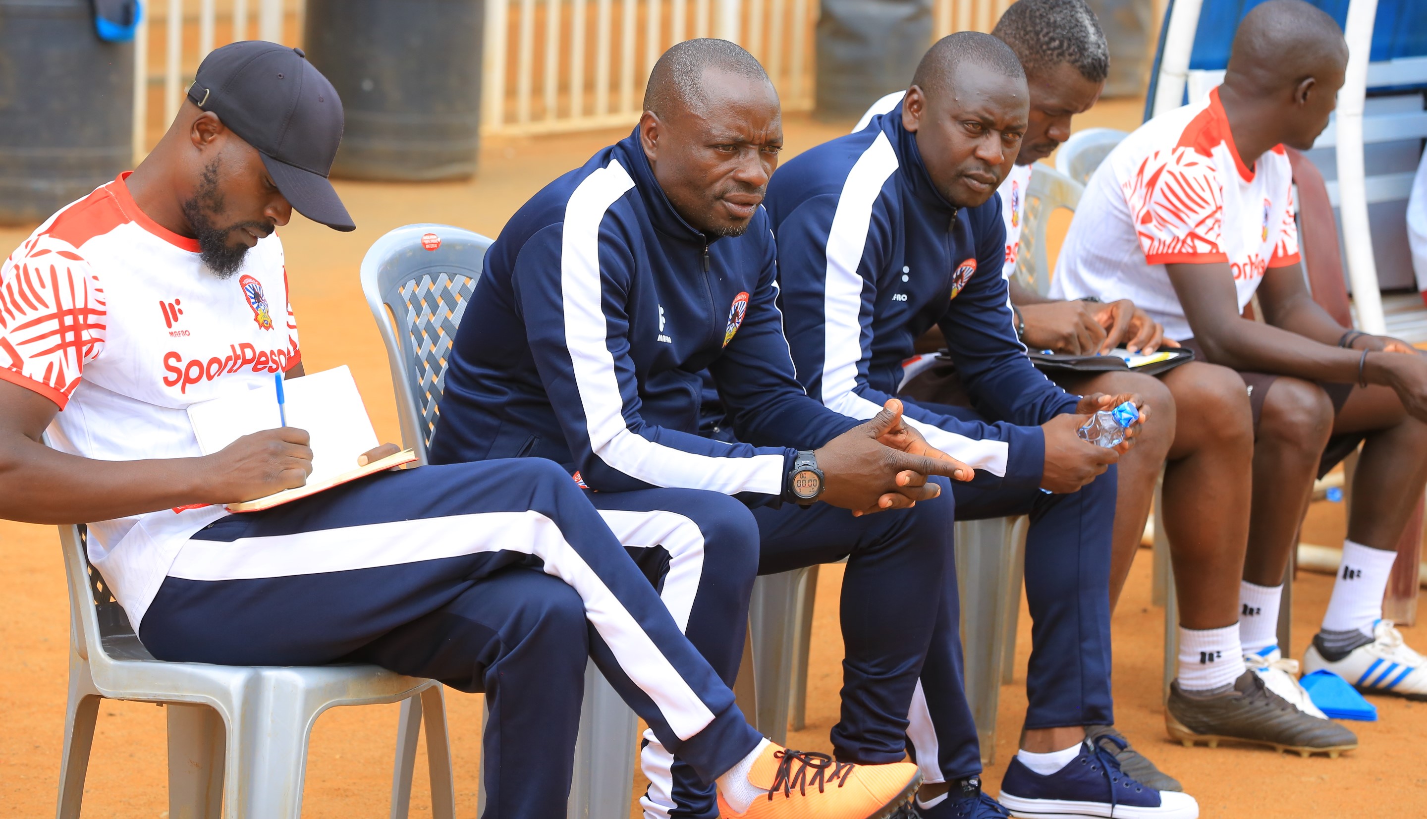 Bernard Mwalala (c) with members of Shabana's technical bench. He is set to join Bandari as head coach
