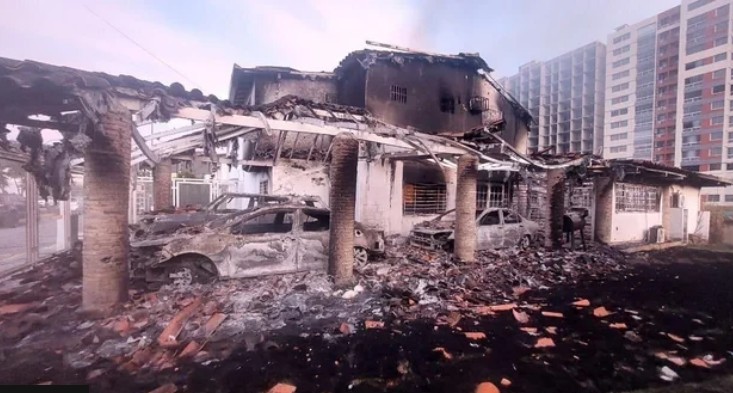 Charred vehicles in Caracas - images show aftermath of US strikes on Venezuela
