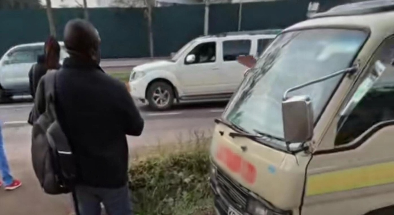 Man blocks matatu using pedestrian path