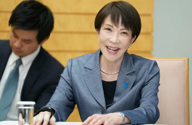 Japan's governing party projected to win snap polls