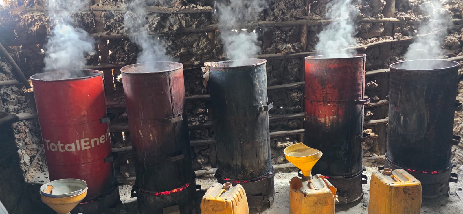 Jomvu top cop in raids to drain toxic drink from Bangladesh slum