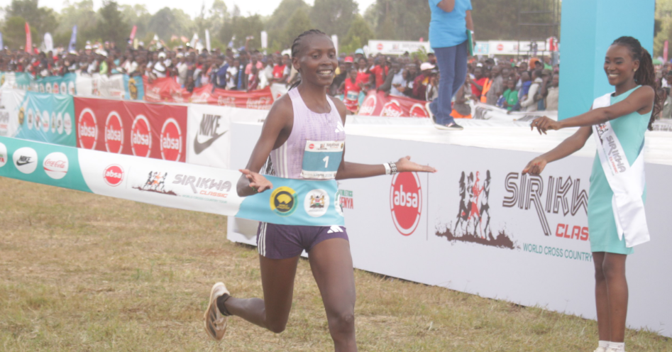Agnes Ng'etich crosses the finishing line to retain the women's 10km race at  Sirikwa Cross Country on Saturday/ANGWENYI GICHANA