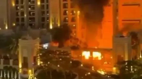 Luxury Dubai hotel hit as Iran launches retaliatory strikes