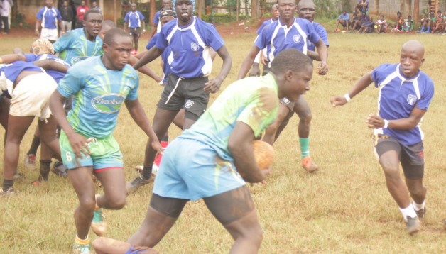 Rugby 15s action between Kisii School (in green) and Cardinal Otunga High School Mosocho yesterday/ANGWENYI GICHANA