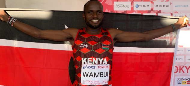 Ian Wambui celebrates after clinching gold in the men's 10, 000m/KSFD
