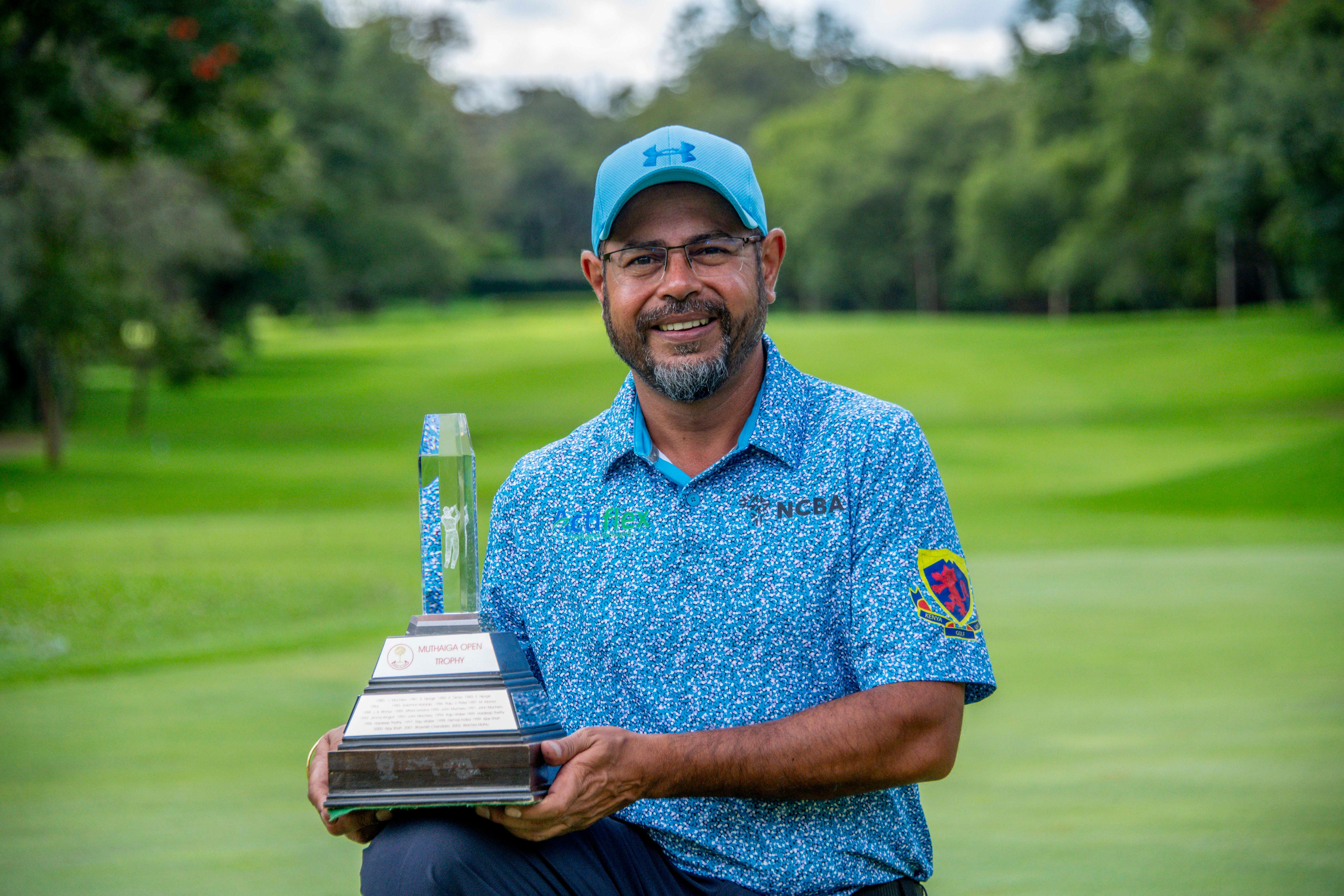 2026 NCBA Muthaiga OPen CHampion Jay Sandhu poses with his trophy