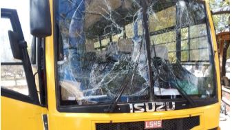 Two students injured after school bus runs over IED