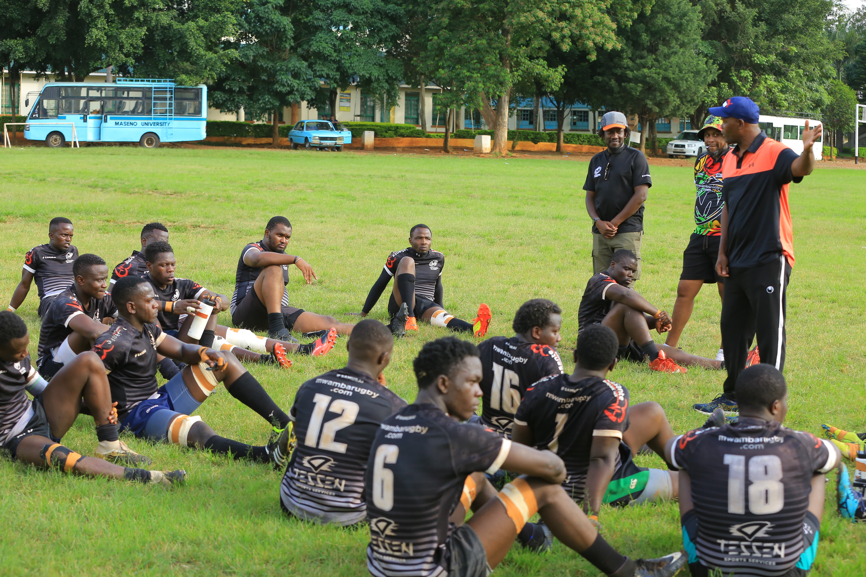 Mwamba RFC coach Paul Murunga gives his charges instructions during the game against Kisii Rugby