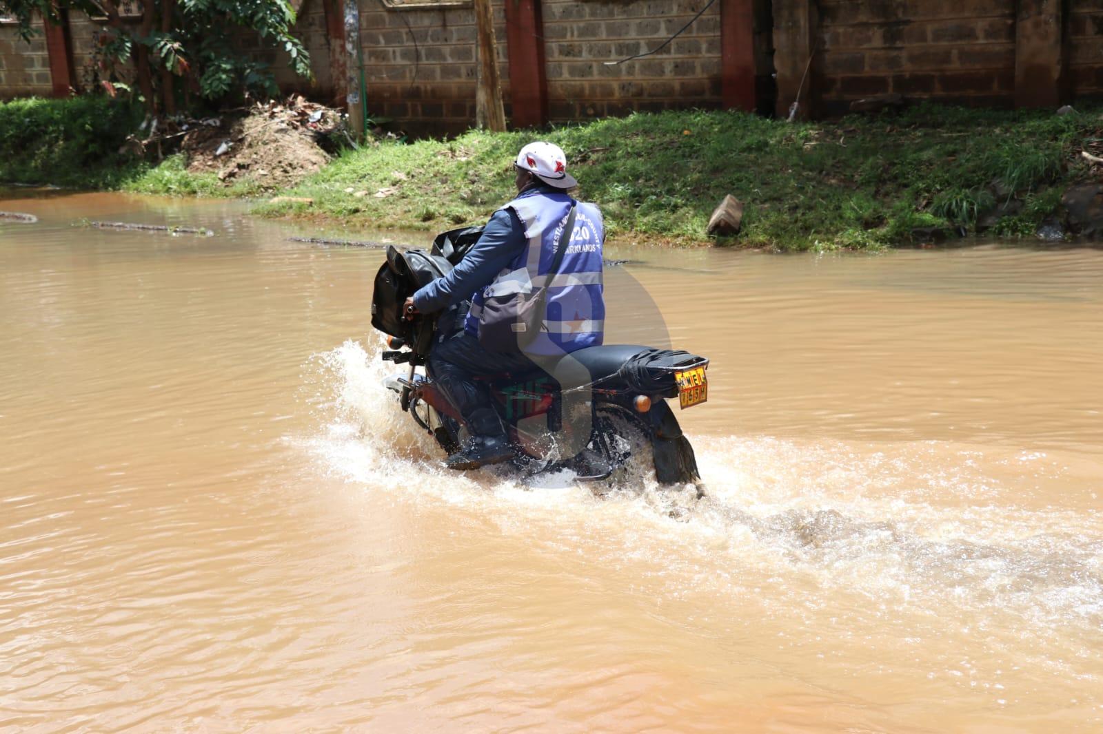 [PHOTOS] Heavy Friday rains disrupt movement
