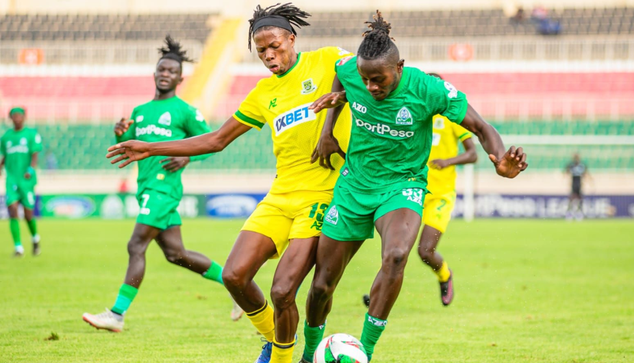 Mathare United midfielder Brian Oburu challenges Gor Mahia's Ebenezer Assifua during a SportPesa League match at Nyayo Stadium on Saturday/GOR MAHIA