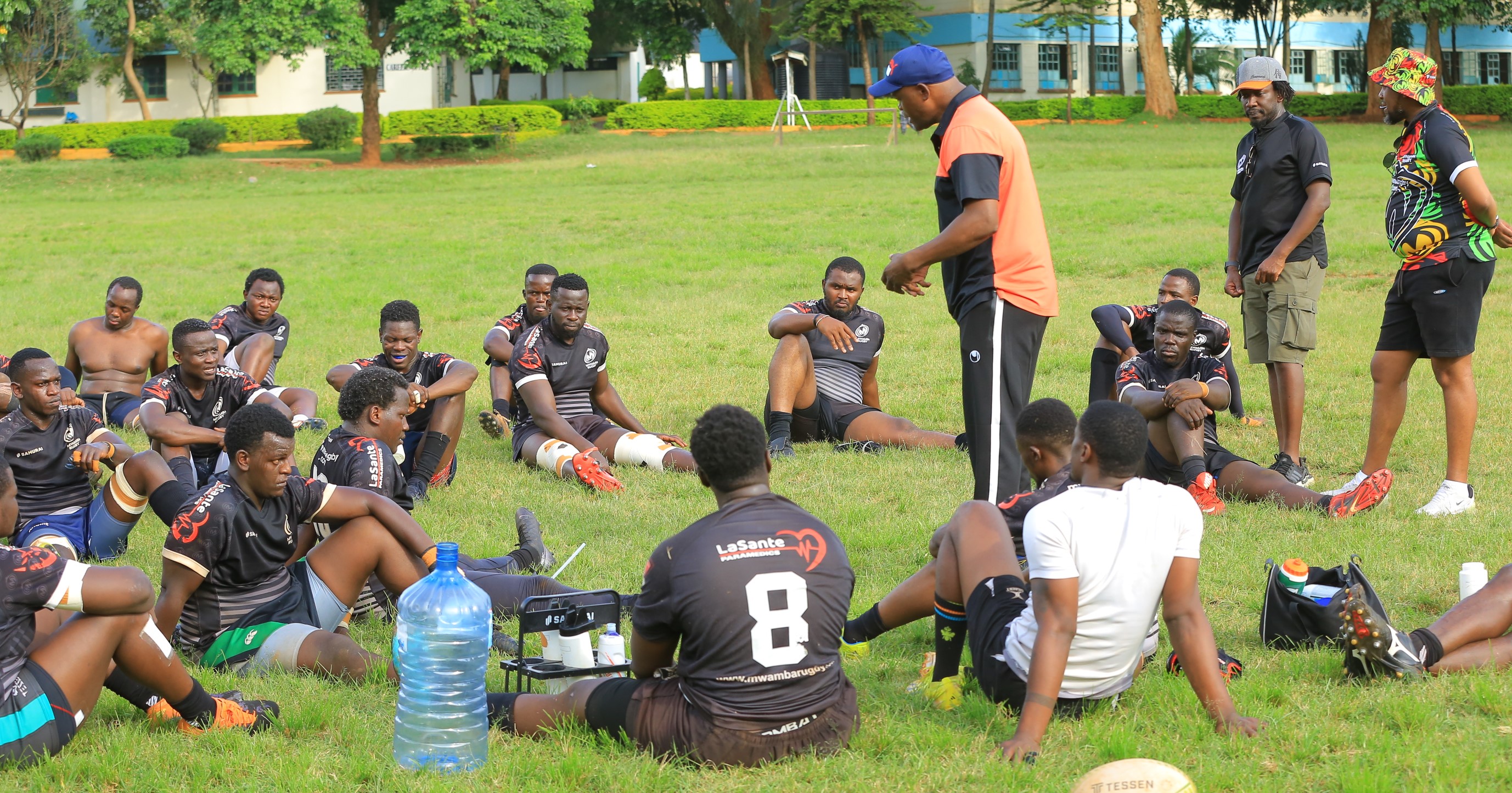 Mwamba RFC coach Paul Murunga gives instructions to his players