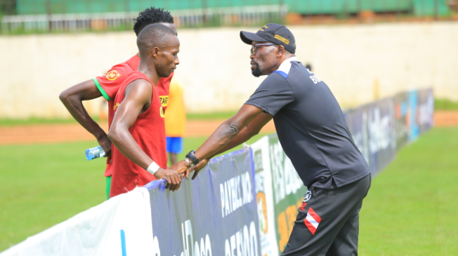 Coach Sammy Pamzo Omollo gives his players instructions during the halftime break/ANGWENYI GICHANA