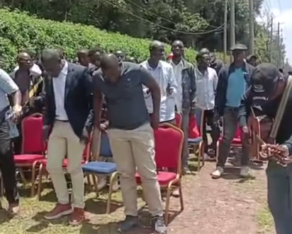 Tuju’s staff hold service outside Karen property