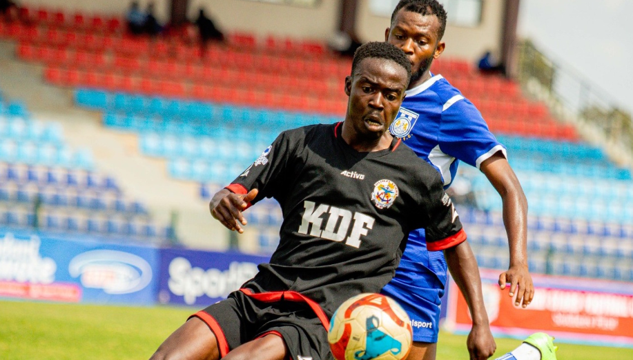 Ulinzis' Paul Okoth shields the ball from Bandari's Amza Ndayou during the first leg of the SportPesa League/ULINZI