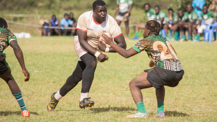 Nondies' prop Boniface Amimo charges at a Nakuru RFC player during a recent Kenya Cup match/HANDOUT
