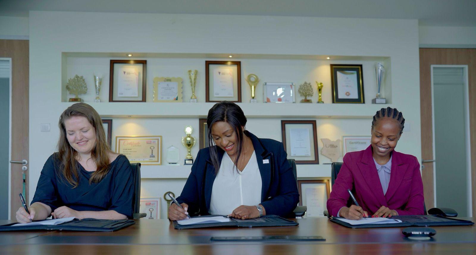 Anzens Acting COO - Kristina Vancova, Credit Bank CEO Betty Korir and Yeshara Tokens Head of Business Development Jasmine Wairimu during the signing ceremony