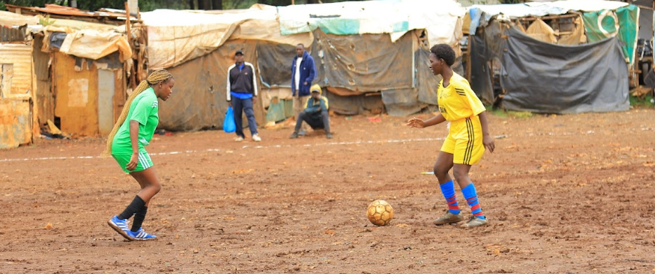 Action between Kibera Girls Soccer Academy and Kibera during the Football Mums tournament held in Kibera over the weekend/ HANDOUT
