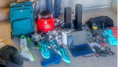 Police arrest 2 suspects, seize stolen items