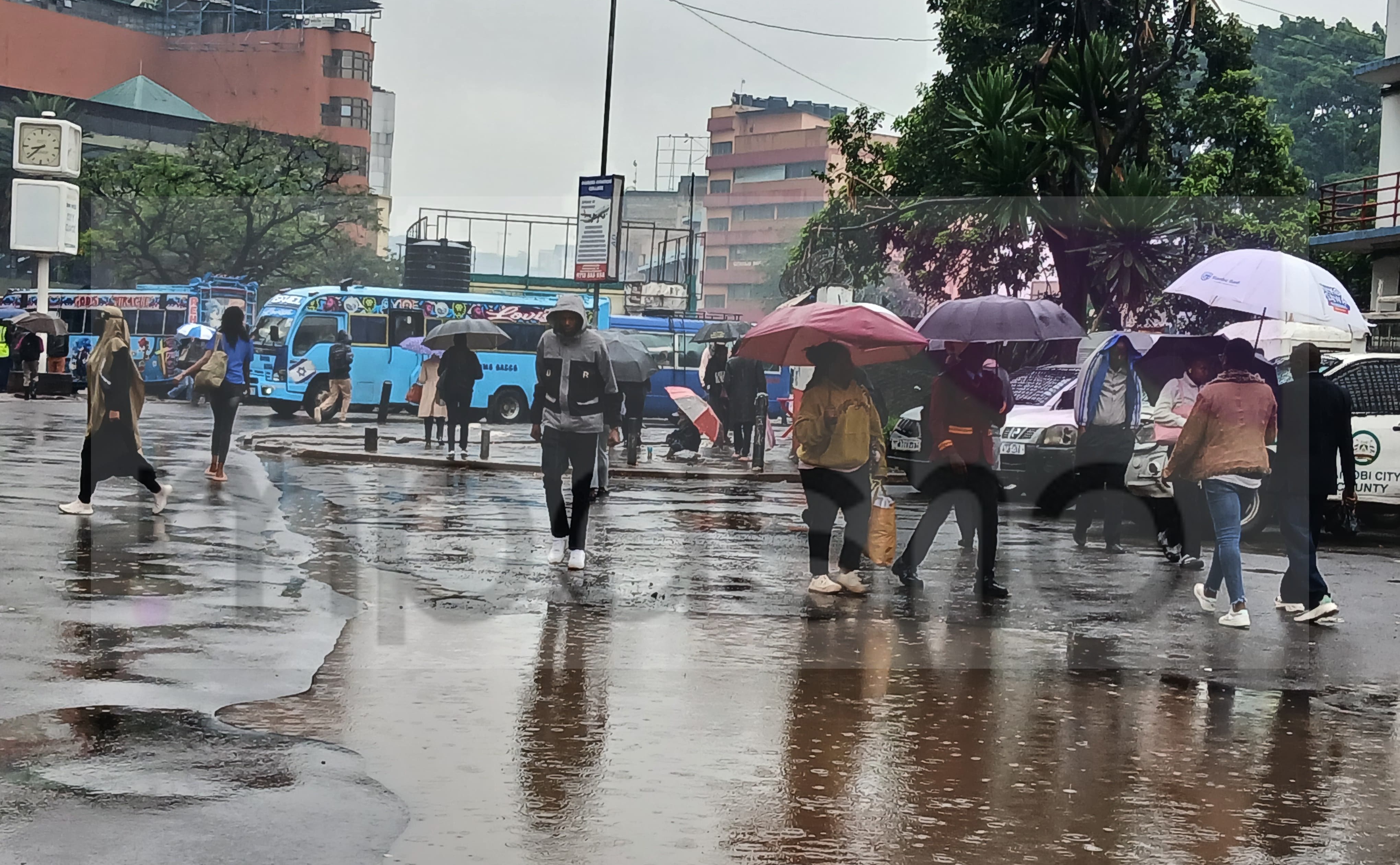 Nairobians brave the heavy rainfall early morning along various parts of Nairobi CBD on April 29, 2026. The Kenya Meteorological Department has issued a heavy rainfall advisory effective through May 1 warning of intensified rainfall and potential flooding across several regions // Leah Mukangai
