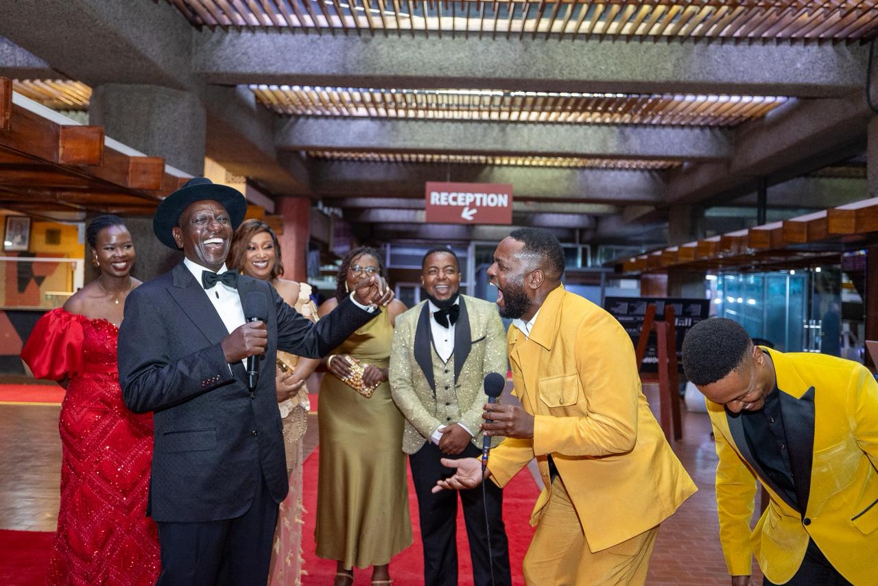 President William Ruto enjoys a light moment at the 14th Kalasha International Film and TV Market Festival and Awards at the Kenyatta International Convention Centre in Nairobi/PCS