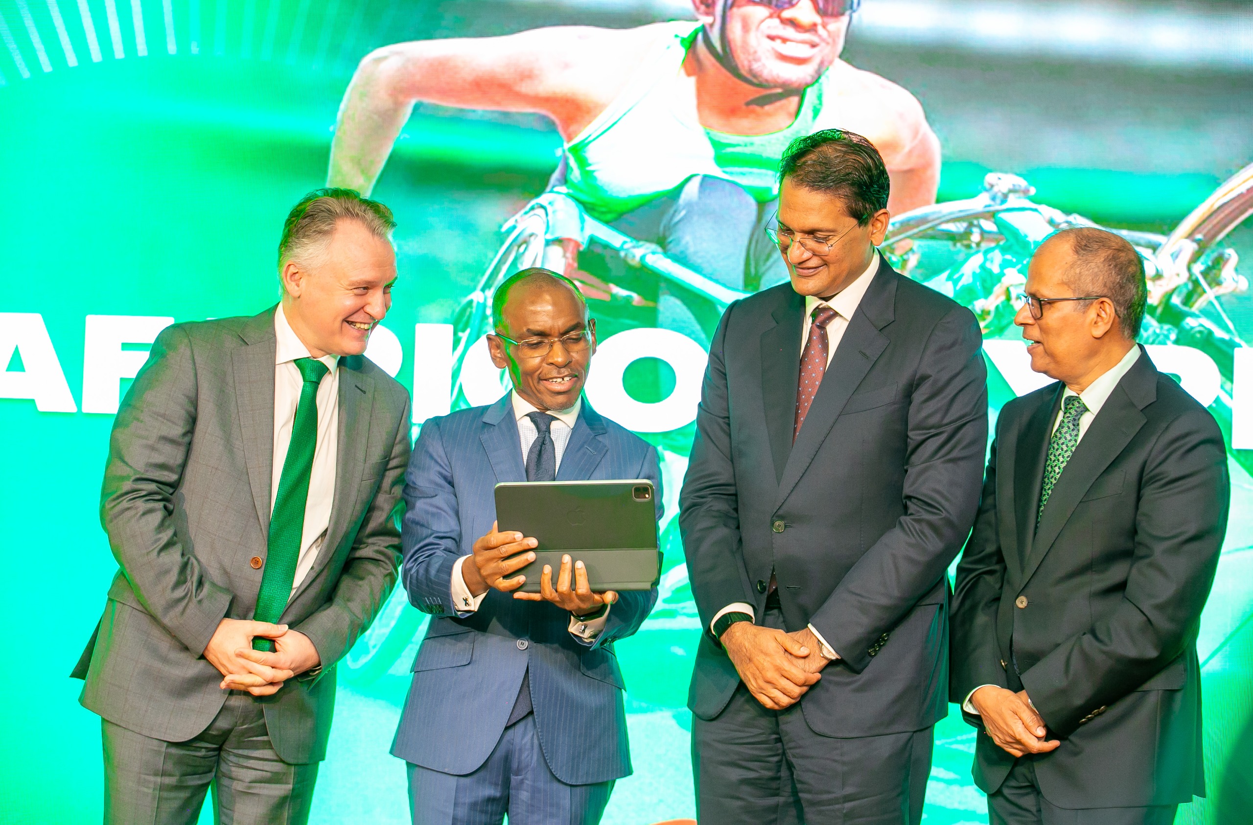 Safaricom Telecommunications Ethiopia  CEO, Wim Vanhelleputte, Group MD and CEO, Peter Ndegwa, telco's Group chairman, Adil Khawaja and Group CFO,  Dilip Pal  at investors briefing in Nairobi on May 7
