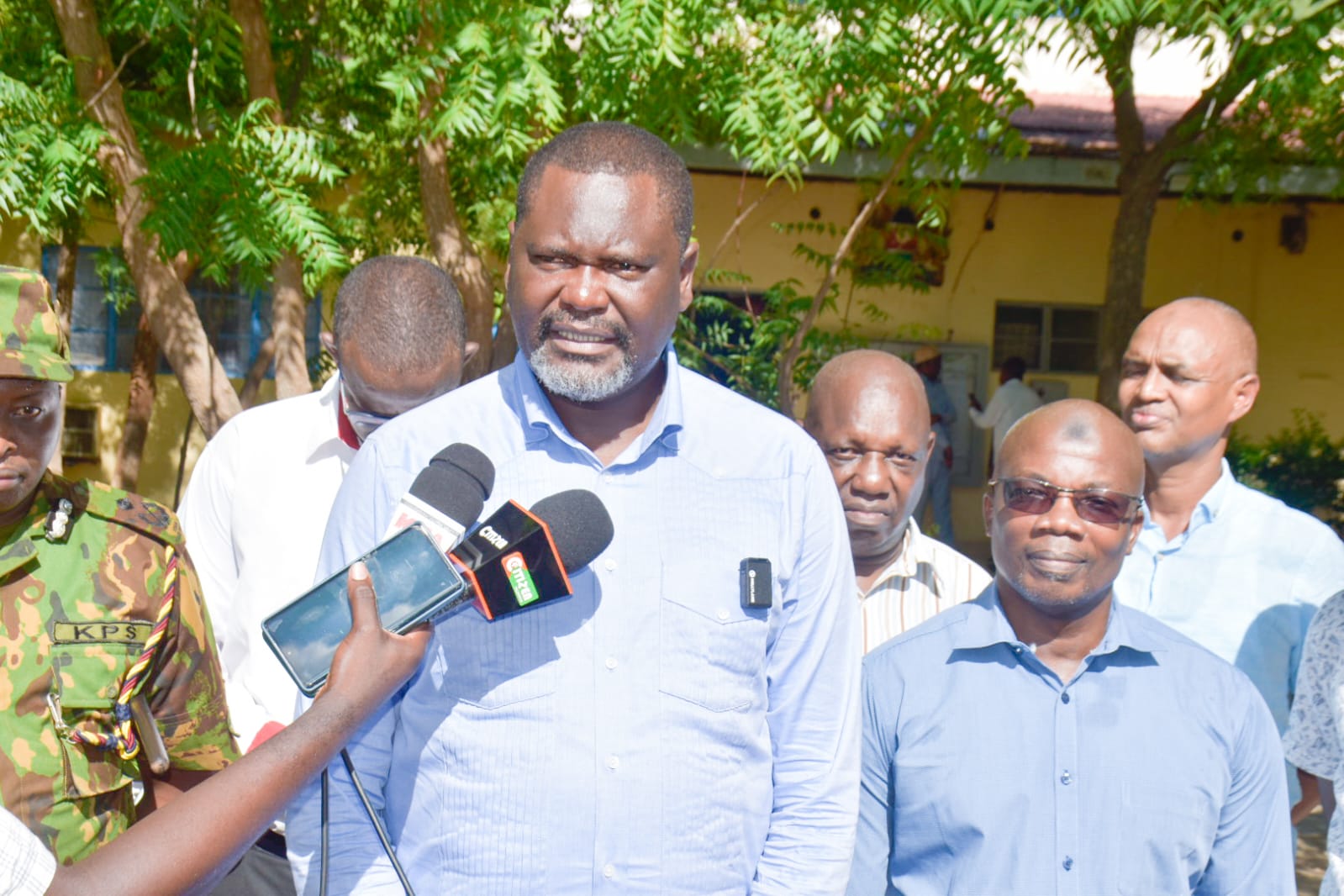Public Service CS  Geoffrey Ruku speaking to journalists outside the Garissa county commissioners office.