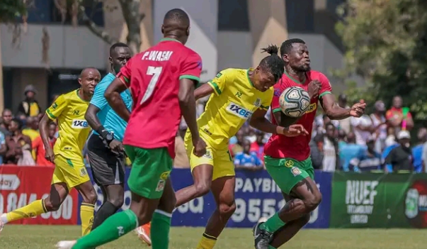 Brian Ouru of Mathare United is sandwiched by Philip Wasai and Francis Omondi of APS Bomet /HANDOUT