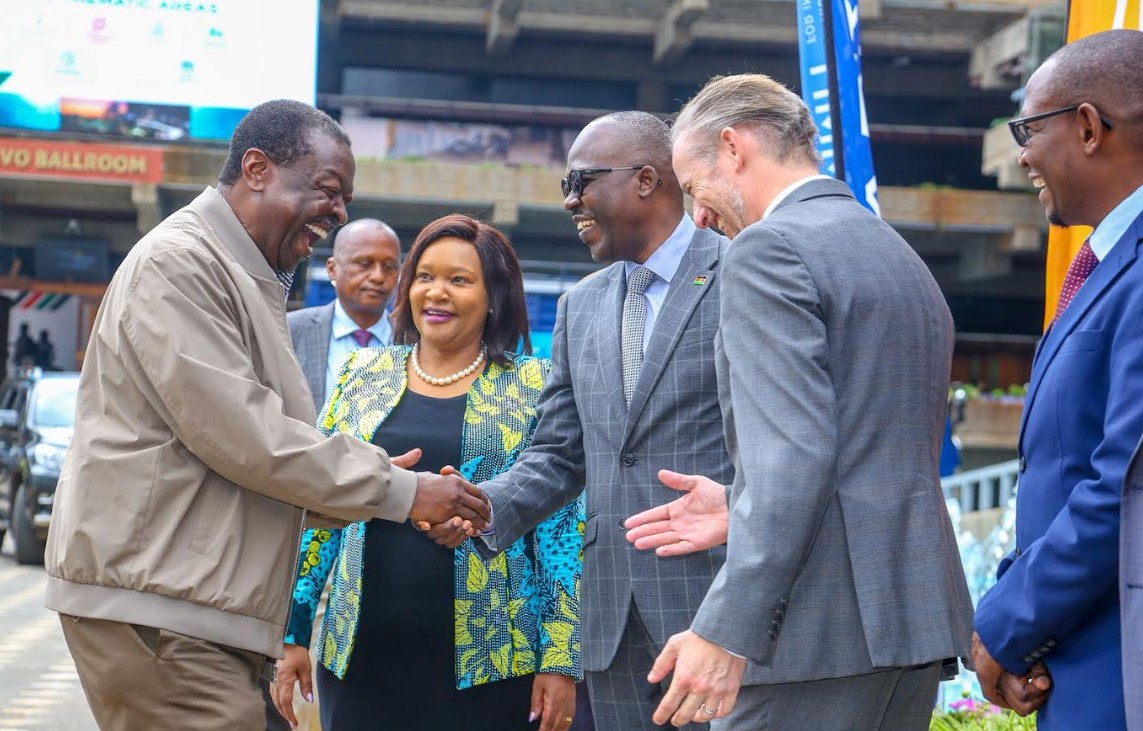 Prime Cabinet Secretary and Cabinet Secretary for Foreign and Diaspora Affairs, Musalia Mudavadi (L), shares a light moment with Cabinet Secretary for Tourism and Wildlife Rebecca Miano (2nd L), Principal Secretary for Foreign Affairs, Korir Sing’Oei (2nd Right) and Ambassador of France to Kenya, Arnaud Suquet (R), upon arrival at the Kenyatta International Convention Centre (KICC) in Nairobi for the Africa Forward Summit Venue Handover and State of Preparedness ceremony