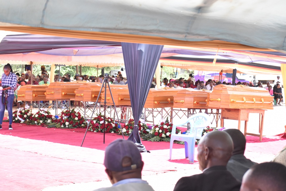 Caskets of the seven victims of the Kwa Kamari bandit attack at the joint requiem mas at Tseikuru Primary School Ground on Saturday