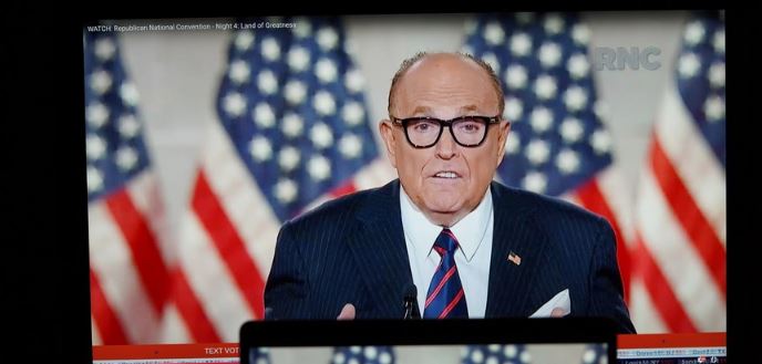 Photo taken in Arlington, Virginia, the United States, Aug. 27, 2020 shows screens displaying former New York City mayor and Trump's personal attorney Rudy Giuliani speaking during the 2020 Republican National Convention from Washington, D.C. (Xinhua/Liu Jie)