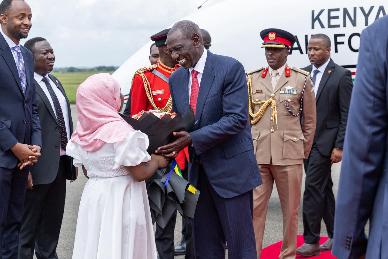 President William Ruto receives a bouquet of flowers when he arrived in Dar es Salaam, Tanzania for a two-day state visit to the neighbouring nation/PCS